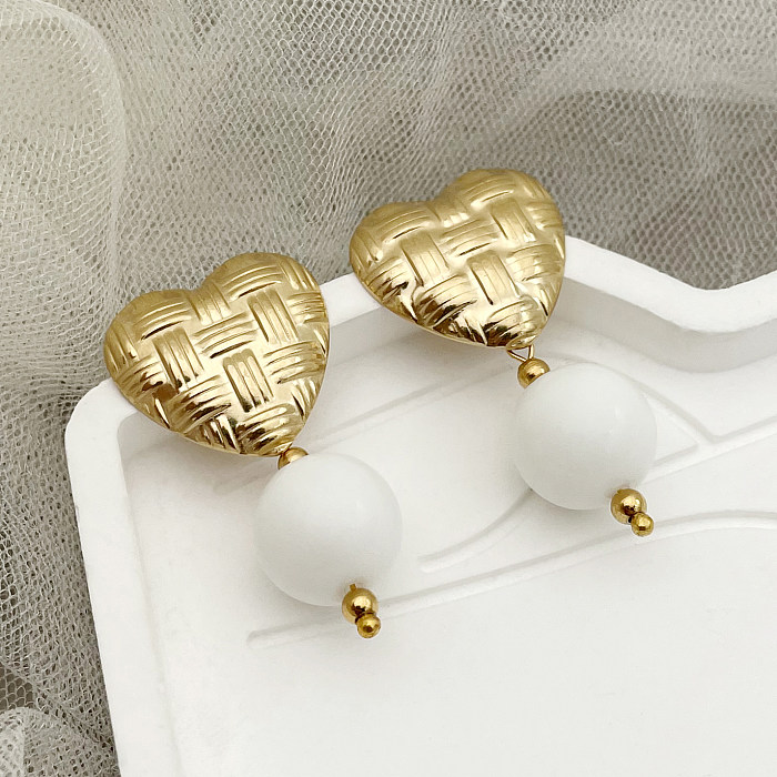 1 par de pendientes colgantes chapados en oro de 14 quilates con forma de corazón retro de acero inoxidable
