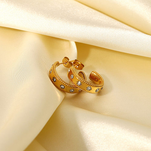 Modische Ohrringe aus 18-karätigem Gold mit eingelegtem Sternzirkon und schlichtem Edelstahl