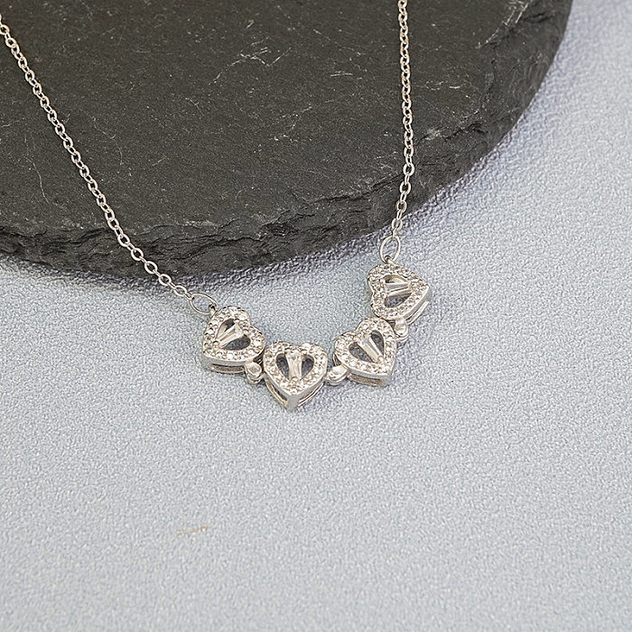 Süße vierblättrige Kleeblatt-Anhänger-Halskette in Herzform aus Edelstahl mit künstlichem Diamant-Inlay