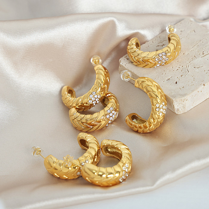1 par de pendientes chapados en oro de 18 quilates con incrustaciones geométricas elegantes y lujosos de acero inoxidable