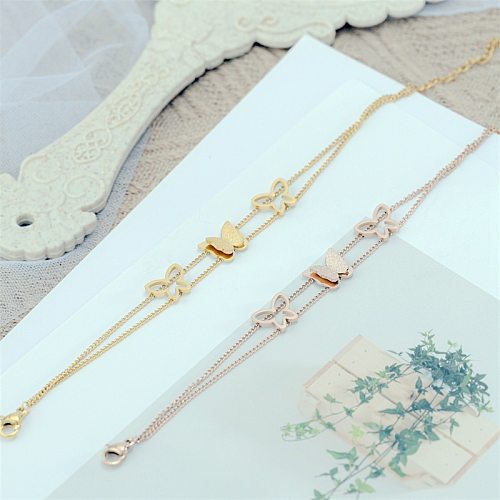 Pulseras de acero de titanio con mariposa dulce