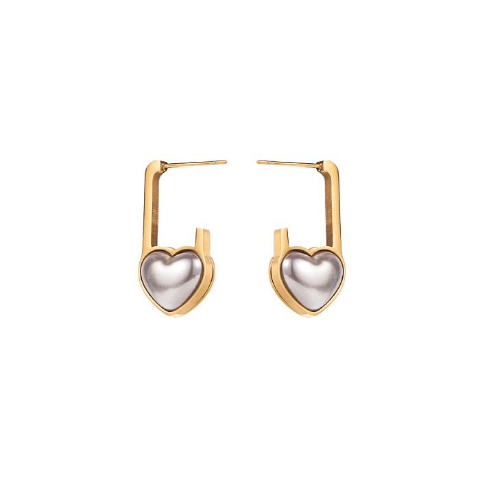 1 par elegante streetwear forma de coração olho incrustação aço inoxidável turquesa strass pérola banhado a ouro brincos