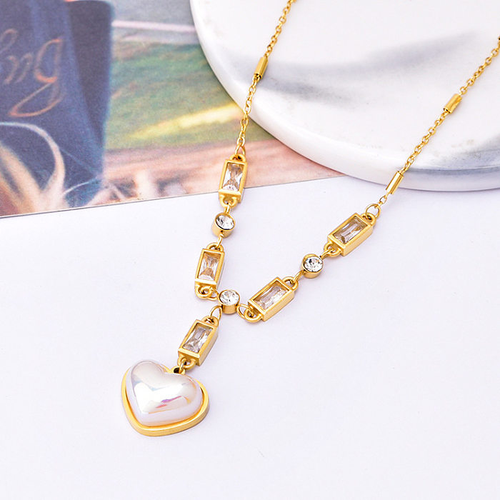 Glamouröse vierblättrige Kleeblatt-Halskette in Herzform mit Edelstahlbeschichtung und künstlichen Perlen