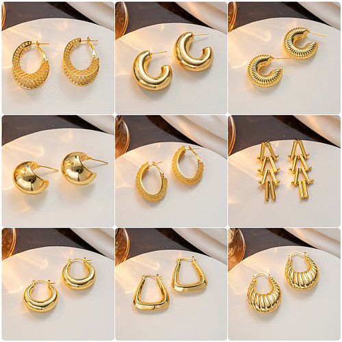 1 par de aretes chapados en oro de 18K de acero inoxidable con revestimiento geométrico en forma de C elegante e informal para mujer
