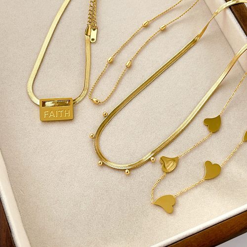 قلادة مطلية بالذهب بتصميم بسيط على شكل قلب بلون الفولاذ المقاوم للصدأ