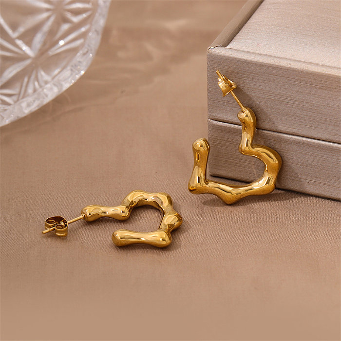 1 par de pendientes chapados en oro de 18 quilates de acero inoxidable con forma de corazón de estilo Simple Retro