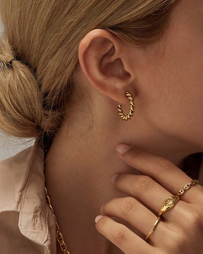 Boucles d'oreilles rétro en or 18 carats torsadées en acier inoxydable à la mode