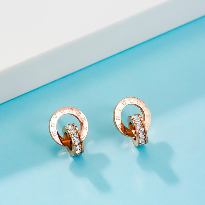 1 Paar Damen-Ohrringe mit rundem Edelstahl-Inlay und Strasssteinen