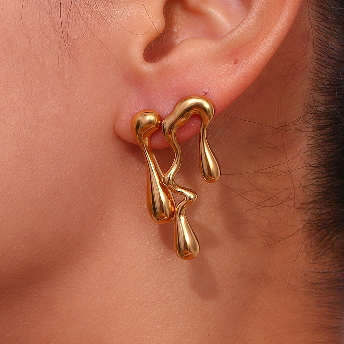 1 paire de clous d'oreilles plaqués asymétriques artistiques en acier inoxydable plaqué or 18 carats