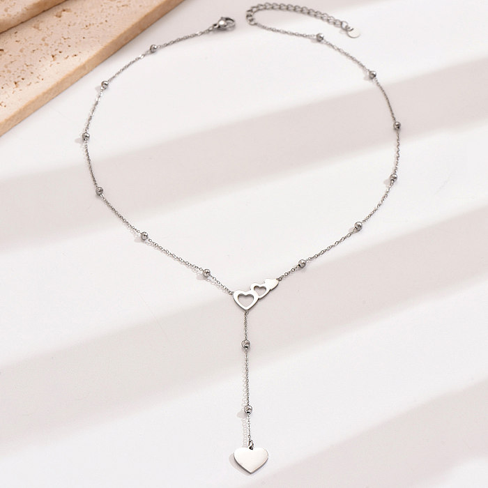 Collar con colgante hueco de cadena de acero inoxidable con forma de corazón, estilo Simple romántico elegante