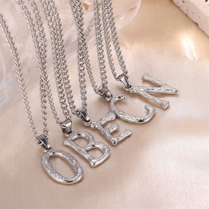 Süße schlichte Halskette mit künstlerischem Buchstaben-Anhänger aus Edelstahl mit 18-karätiger Vergoldung
