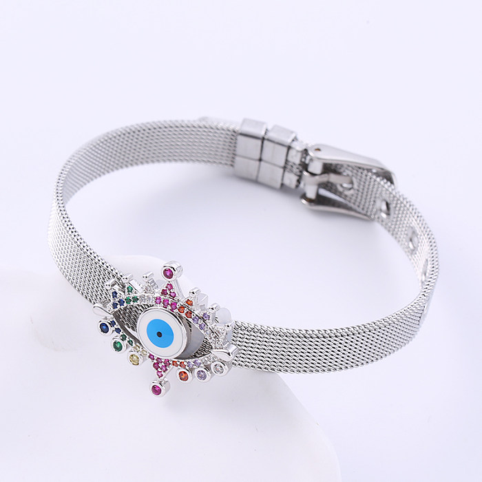 Bracelet élégant en acier inoxydable avec incrustation de zircon en forme de coeur en forme d'oeil du diable