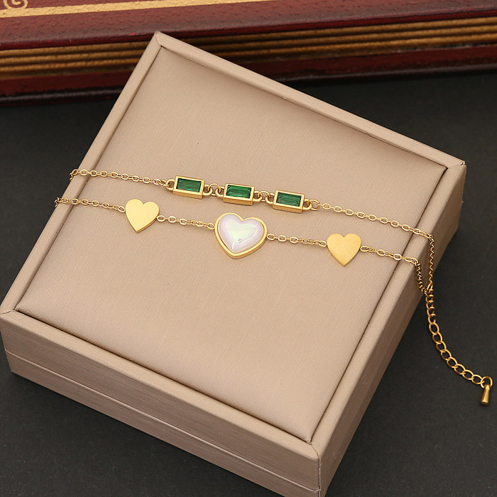Atacado glam estilo vintage formato de coração flor titânio chapeamento de aço embutido pulseiras de zircônia banhadas a ouro 18K