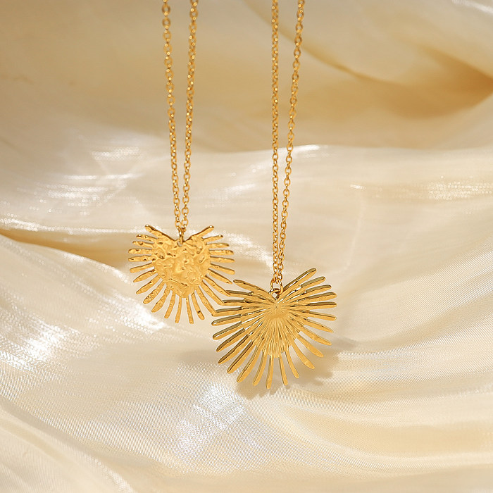 Collar con colgante chapado en oro de 18 quilates de acero inoxidable con forma de corazón estilo francés estilo IG