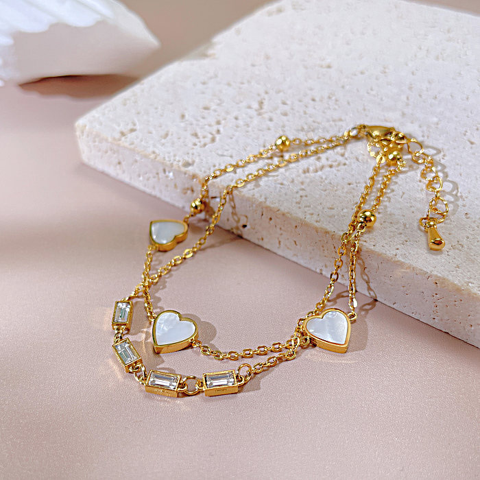 Elegantes pulseiras de aço titânio em forma de coração em estilo francês
