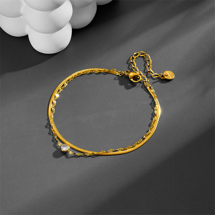 Bracelets plaqués or Zircon en couches d'acier titane rond de style simple