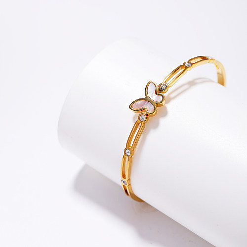 Bracelet plaqué or 18 carats avec incrustation de placage de coque en acier inoxydable papillon de transport de style simple