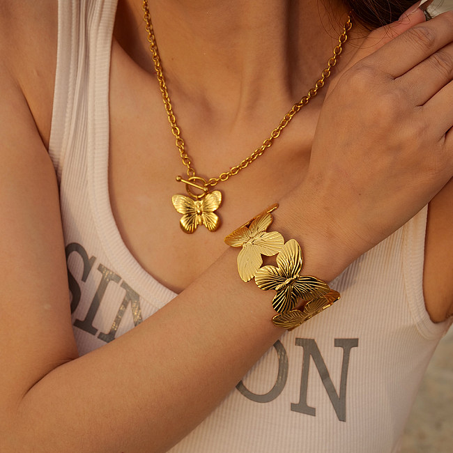 Bracelet plaqué or 18 carats en acier inoxydable avec papillon style streetwear rétro de style IG