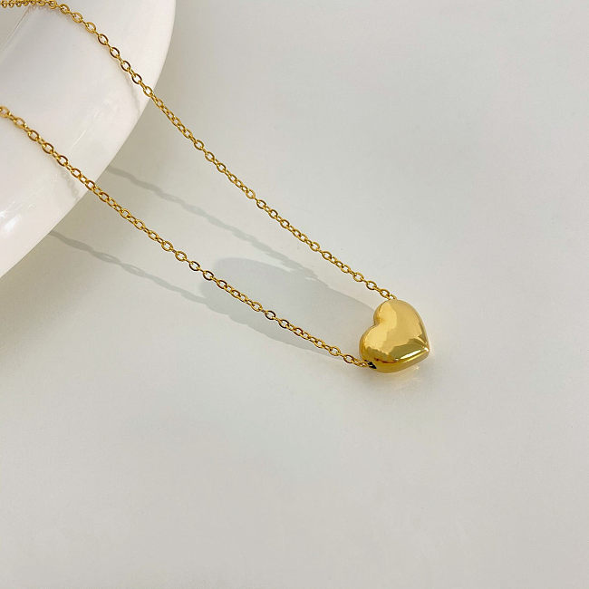 Collier pendentif en acier inoxydable en forme de cœur de style simple en vrac