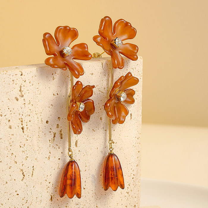 1 Paar lässige, süße, schlichte Blumen-Beschichtungs-Inlay-Ohrringe aus Edelstahl mit Zirkon und vergoldet