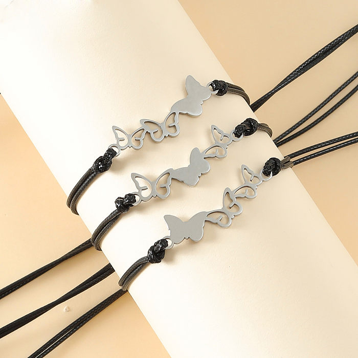 MAMA Juego de 3 pulseras huecas de cuerda de acero inoxidable con mariposa de estilo simple