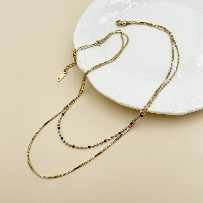 Elegante, schlichte, farbenfrohe, mehrschichtige Halsketten aus Edelstahl mit Perlenbeschichtung und vergoldeter Schichtung