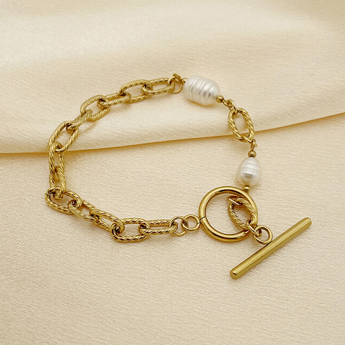 Elegante, einfarbige, vergoldete Armbänder aus Edelstahl mit Knebel- und Perlenbeschichtung im britischen Stil