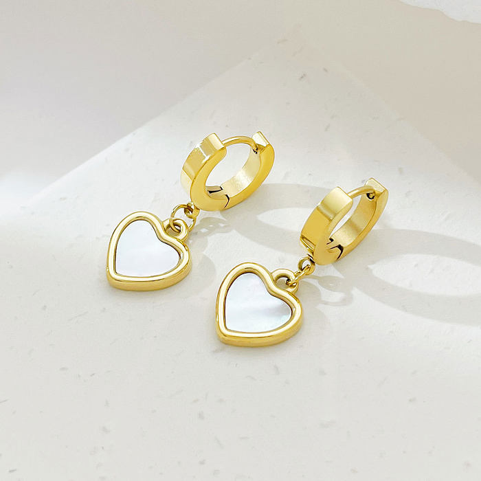 1 paire de boucles d'oreilles plaquées en forme de cœur de style classique en acier inoxydable plaqué or blanc