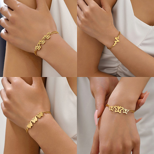 Pulseras chapadas en oro de 18 quilates con revestimiento de acero inoxidable y mariposa de electrocardiograma de estilo simple y dulce