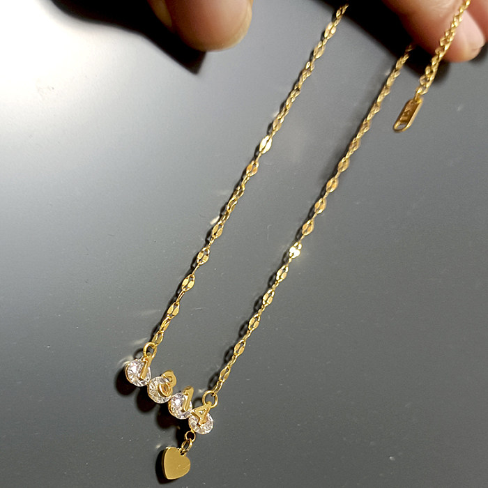 Collar con colgante chapado en oro de 18 quilates con diamantes de imitación y incrustaciones de acero inoxidable con números elegantes