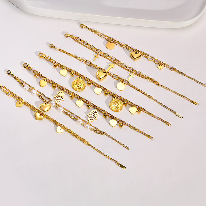 Pulseras chapadas en oro de acero inoxidable con forma de corazón de estilo romano de vacaciones a granel