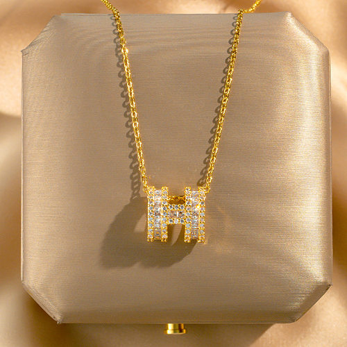 Collier pendentif plaqué or avec incrustation de placage en acier inoxydable avec lettre de trajet