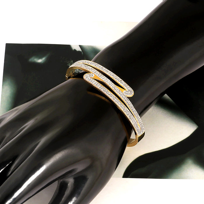 Bracelet rond en acier inoxydable avec incrustation de strass de style classique