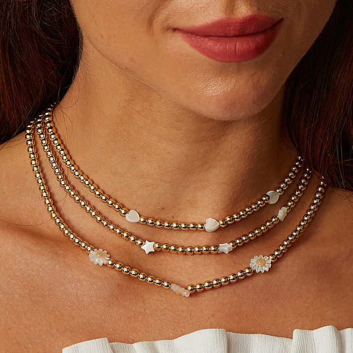Elegante schlichte Halskette mit Stern- und Herzform-Blume-Edelstahl-Muschelbeschichtung