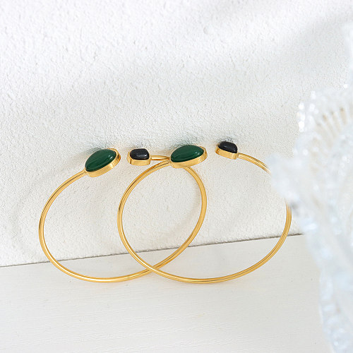 Elegante ovale Manschettenarmbänder mit Titan-Stahlbeschichtung und Achat-Inlay, 18 Karat vergoldet