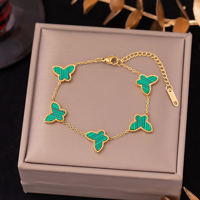 Bracelets plaqués or 18 carats avec incrustation en acier titane papillon doux