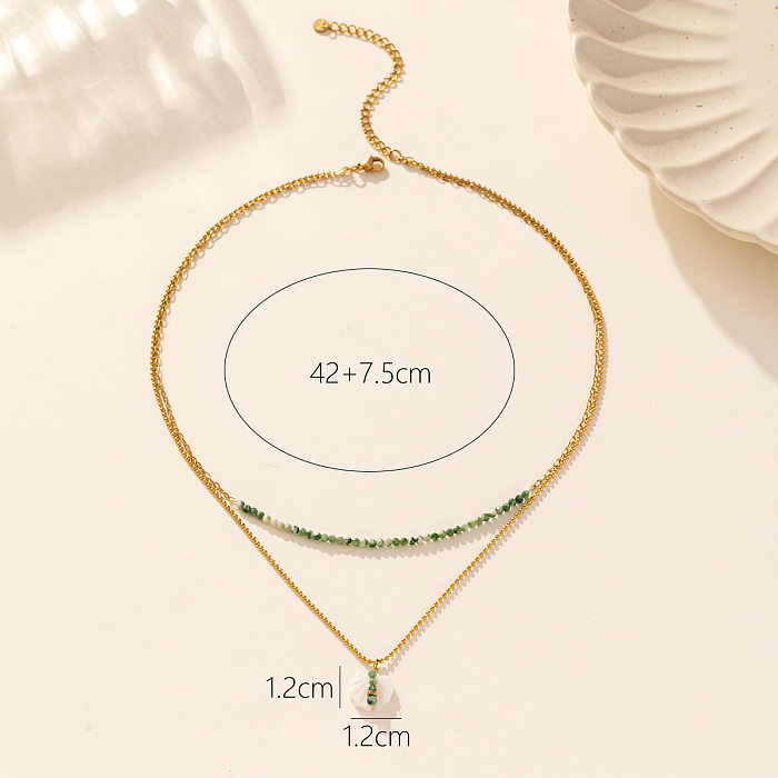 Elegante, mehrschichtige Halsketten mit Farbblock-Edelstahllegierung und Muschelperlenbeschichtung, vergoldet