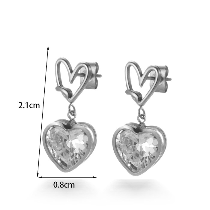 1 paire de boucles d'oreilles pendantes élégantes de style simple et géométrique en forme de cœur avec incrustation de placage de fleurs en acier inoxydable et zircon plaqué or 18 carats