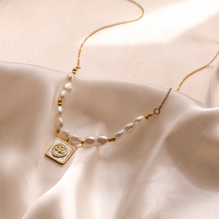 Collier pendentif plaqué or 18 carats avec incrustation de placage en acier inoxydable pour œil de trajet de style simple