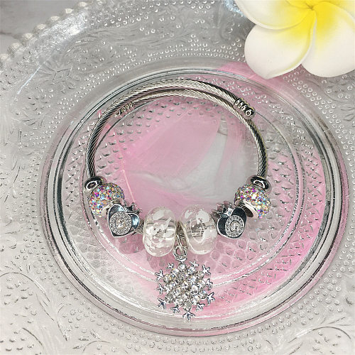 Brazalete de piedras preciosas artificiales con incrustaciones de acero inoxidable con diseño de copo de nieve de estilo clásico