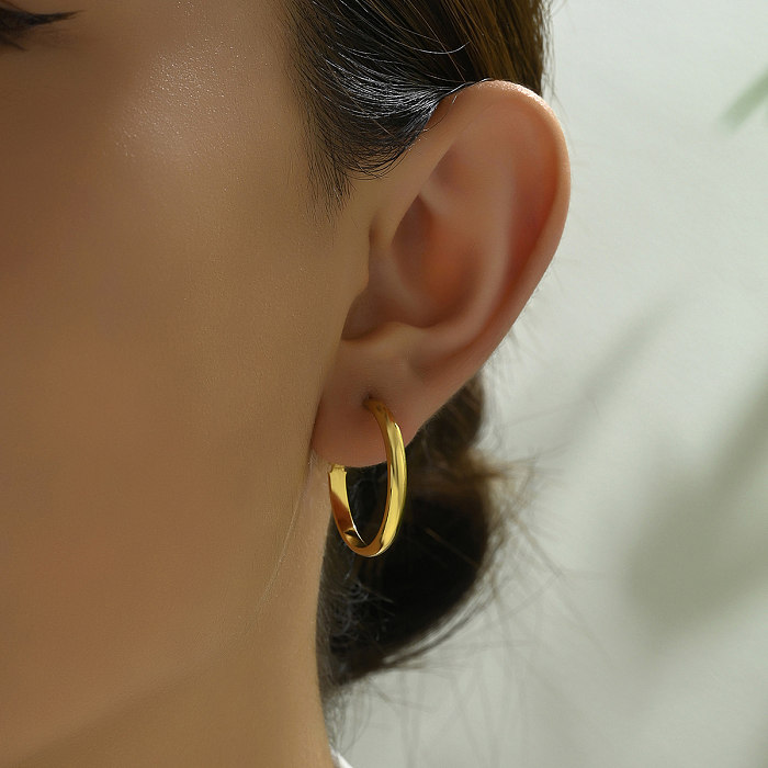 1 paire de boucles d'oreilles plaquées or 18 carats en acier inoxydable plaqué rond de base de style IG