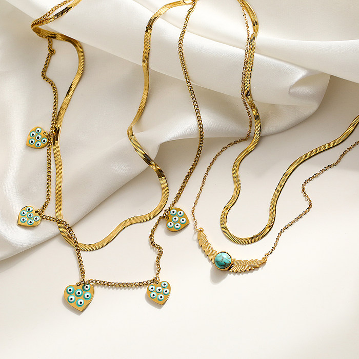 Schlichter Pendel-Halskette mit geometrischem Anhänger aus Edelstahl mit Emaille-Beschichtung und 18-Karat-Vergoldung
