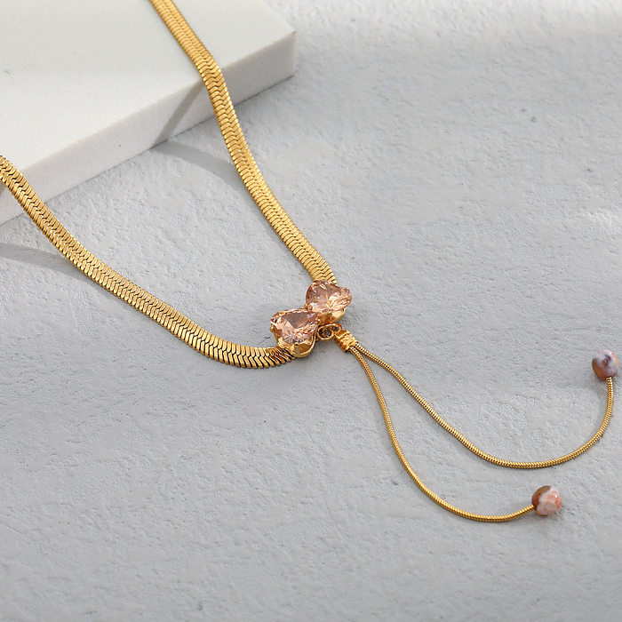 قلادة كاجوال بسيطة على شكل قلب على شكل فيونكة وعقدة من الفولاذ المقاوم للصدأ مرصعة بالزركون ومطلية بالذهب عيار 18 قيراط
