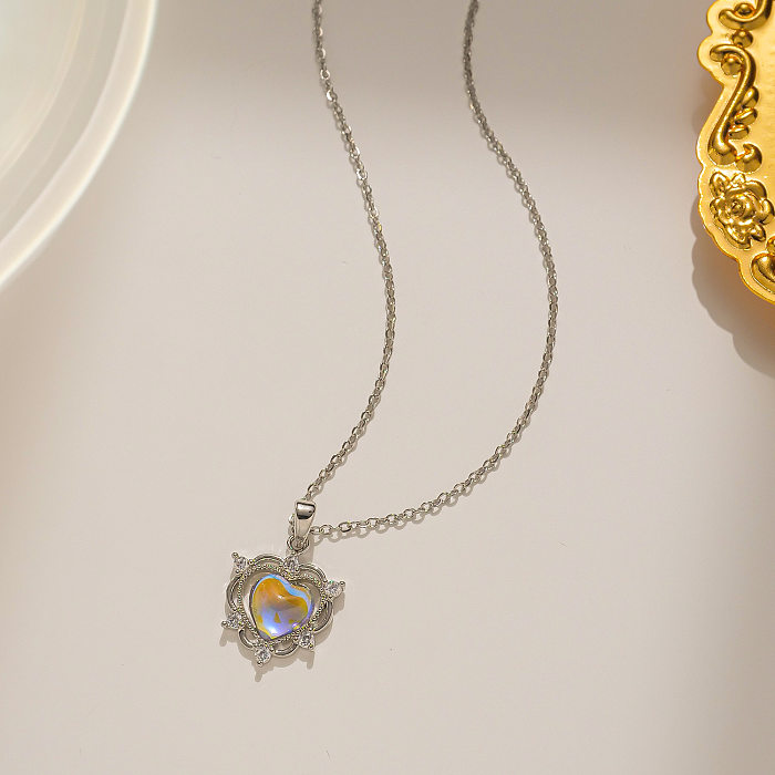 Collier pendentif en cristal avec incrustation de placage en acier inoxydable en forme de cœur de style simple
