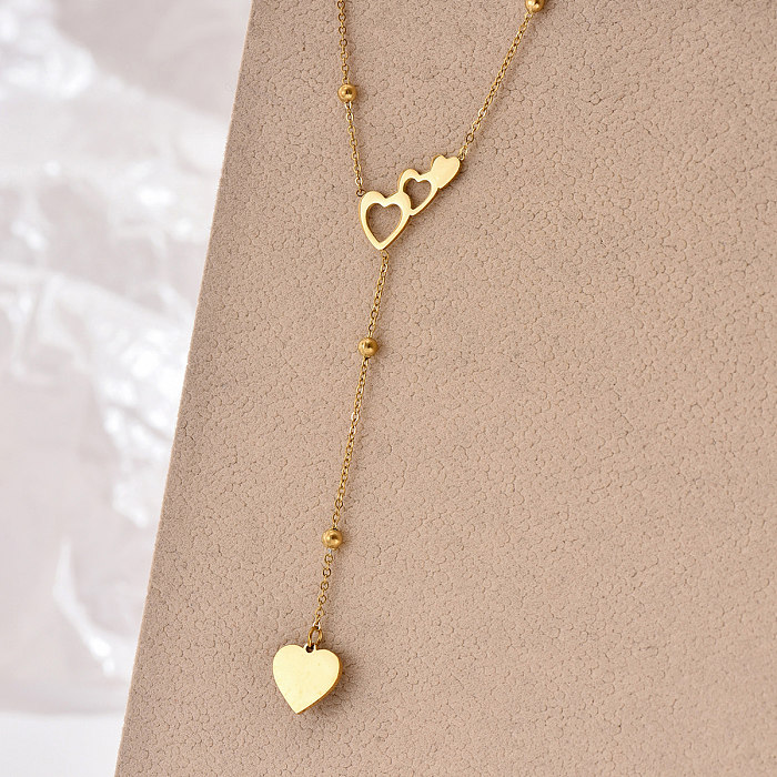 Elegante romântico estilo simples formato de coração chapeamento de aço inoxidável oco colar com pingente banhado a ouro 14K