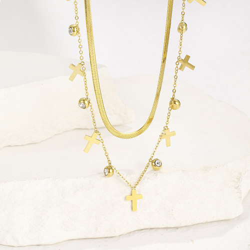 Collar chapado en oro de 18 quilates con incrustaciones de diamantes de imitación y cruz de hip-hop
