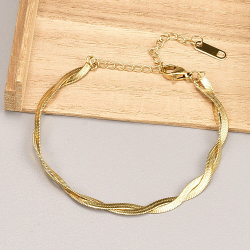 Einfaches Retro-Armband aus 18 Karat Gold mit doppelter Drehung aus Titanstahl für Damen