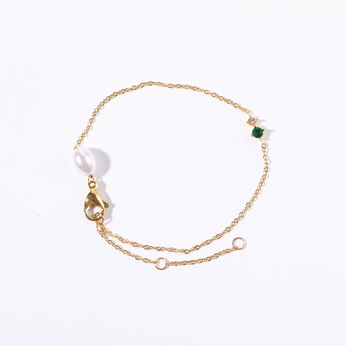 Schlichte, runde Armbänder aus Titanstahl mit Perlenbeschichtung und Zirkoneinlage, 14 Karat vergoldet
