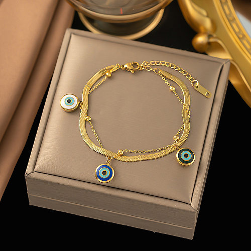 Bracelets plaqués or 18 carats en acier titane avec oeil du diable de style simple