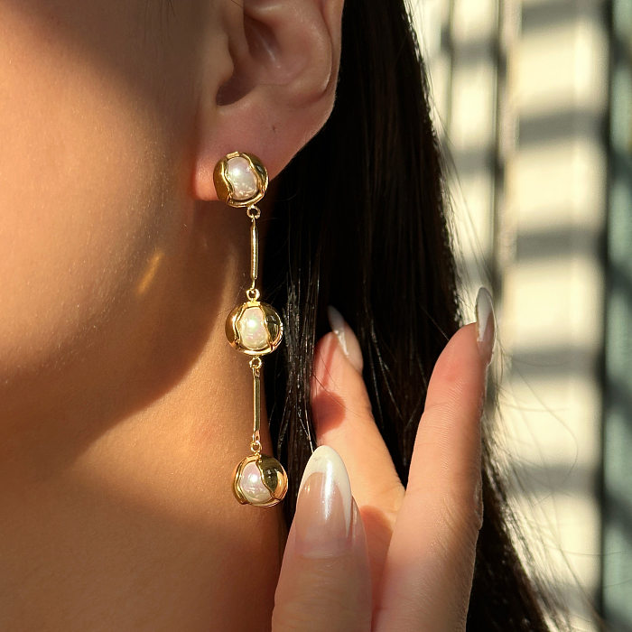 1 paire de boucles d'oreilles pendantes en acier inoxydable plaqué or 18 carats, style moderne